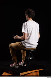 Whole Body Man White Shirt Trousers Slim Sitting Studio photo references